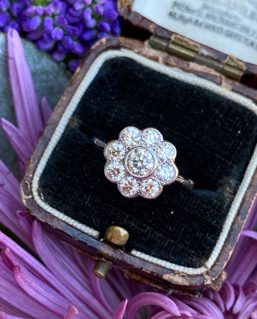 Diamond daisy engagement on sale ring