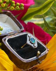 Art Deco Emerald and Diamond Cluster Platinum Ring 0.30ct + 0.60ct